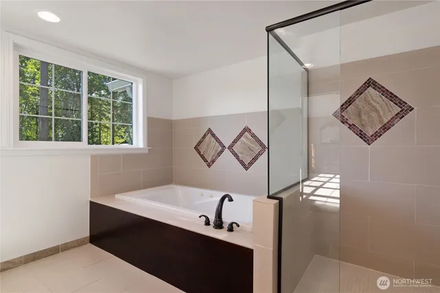 a bathroom with a sink and a window