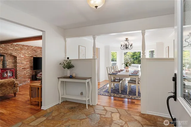 a view of a dining room with furniture window and outside view