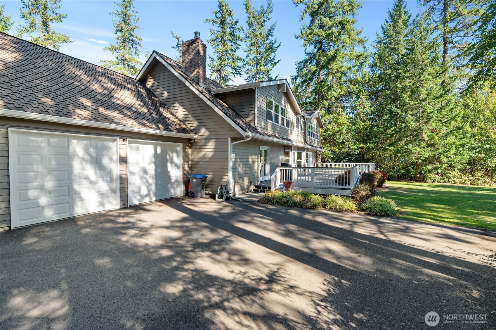 4293 Northwest Westgate Road Silverdale, WA 98383 - Photo 33 of 37 a front view of a house with a yard