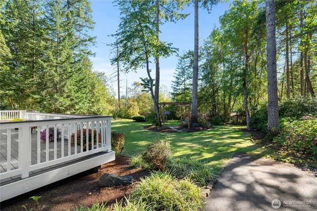 a view of a deck with a backyard