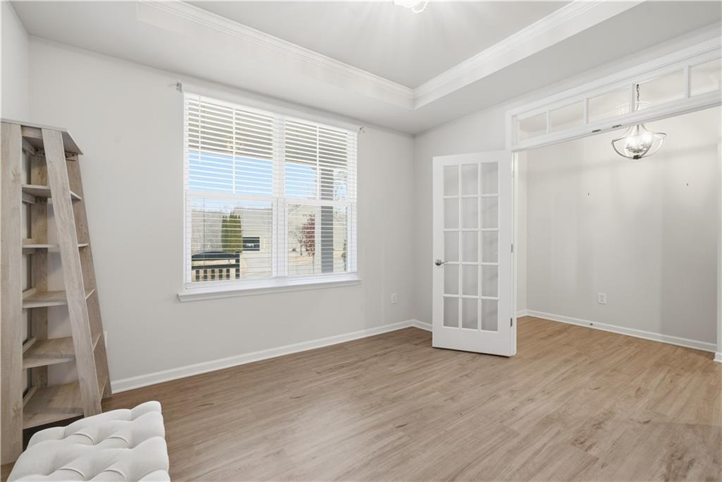 15 Parkside View Cartersville, GA 30121 - Photo 11 of 49 an empty room with wooden floor and windows