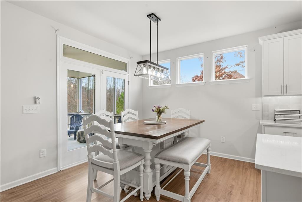 15 Parkside View Cartersville, GA 30121 - Photo 16 of 49 a view of a dining room with furniture window and wooden floor