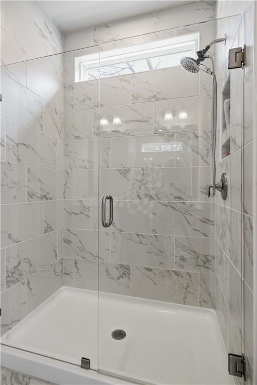 15 Parkside View Cartersville, GA 30121 - Photo 26 of 49 a bathroom with a shower and a bath tub