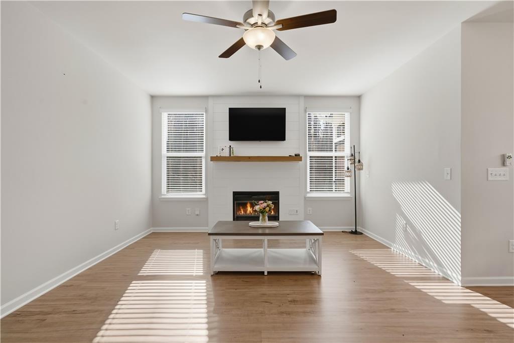 15 Parkside View Cartersville, GA 30121 - Photo 3 of 49 a living room with furniture and a fireplace