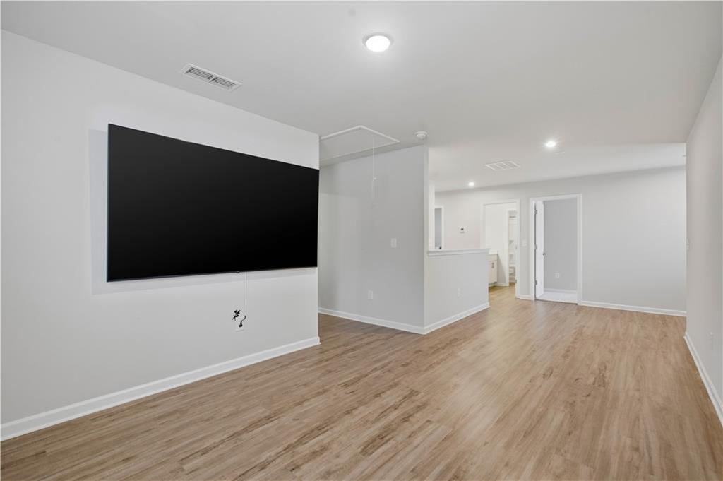 15 Parkside View Cartersville, GA 30121 - Photo 32 of 49 a view of an empty room with wooden floor and wooden floor