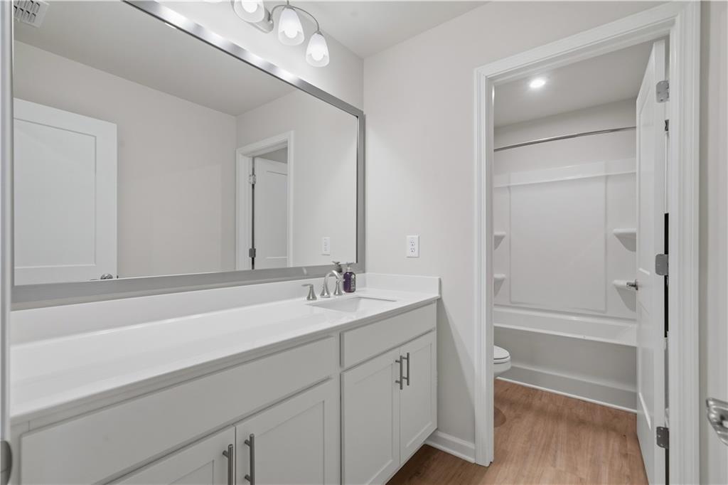 15 Parkside View Cartersville, GA 30121 - Photo 34 of 49 a bathroom with a sink a vanity and a mirror