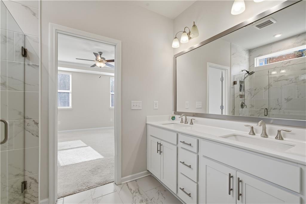 15 Parkside View Cartersville, GA 30121 - Photo 4 of 49 a bathroom with a granite countertop sink mirror and double