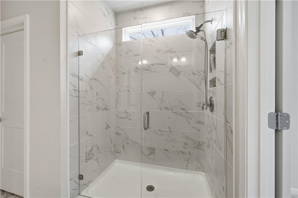 15 Parkside View Cartersville, GA 30121 - Photo 5 of 49 a bathroom with a shower and a bath tub