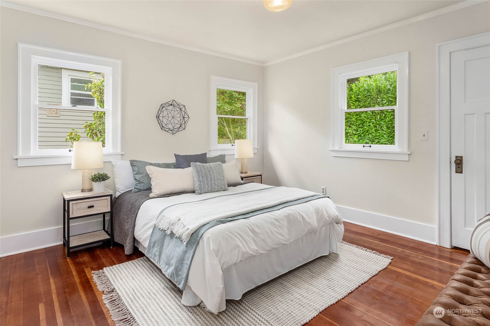 2368 North 52nd Street Seattle, WA 98103 - Photo 17 of 32 a bedroom with a bed and a window
