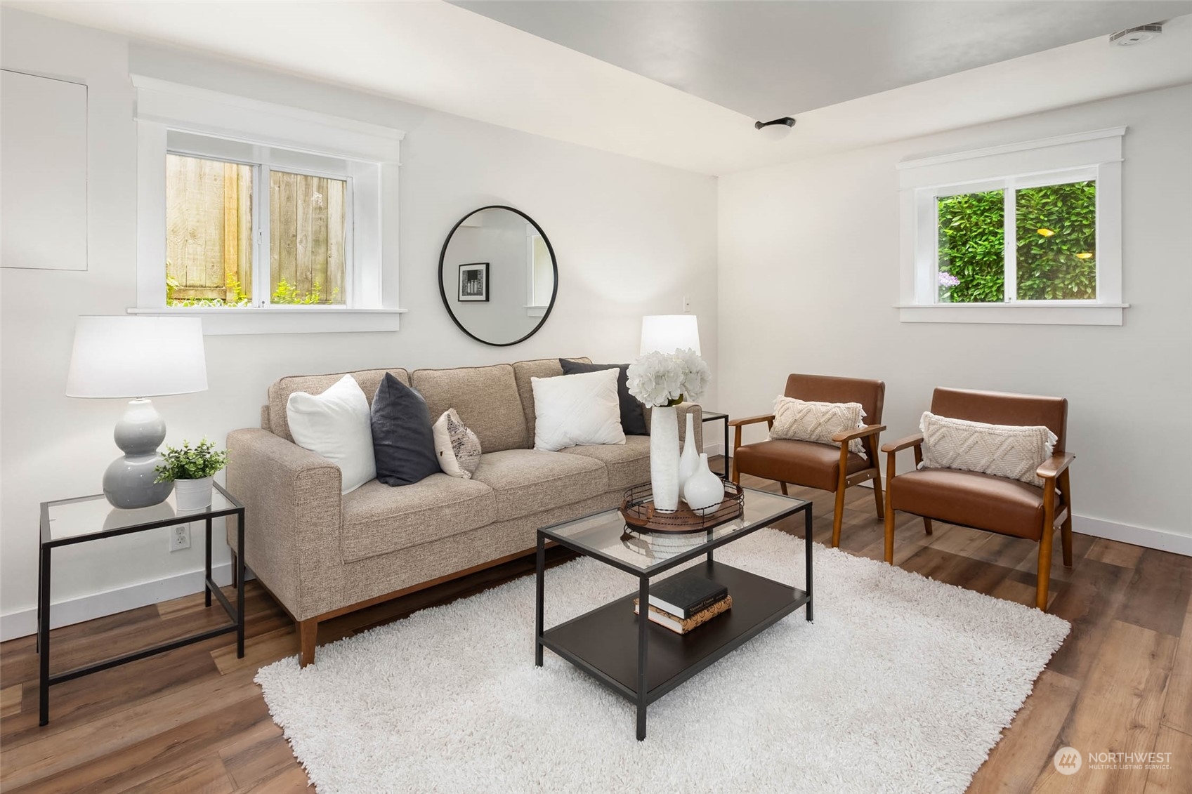 2368 North 52nd Street Seattle, WA 98103 - Photo 20 of 32 a living room with furniture a rug and a window