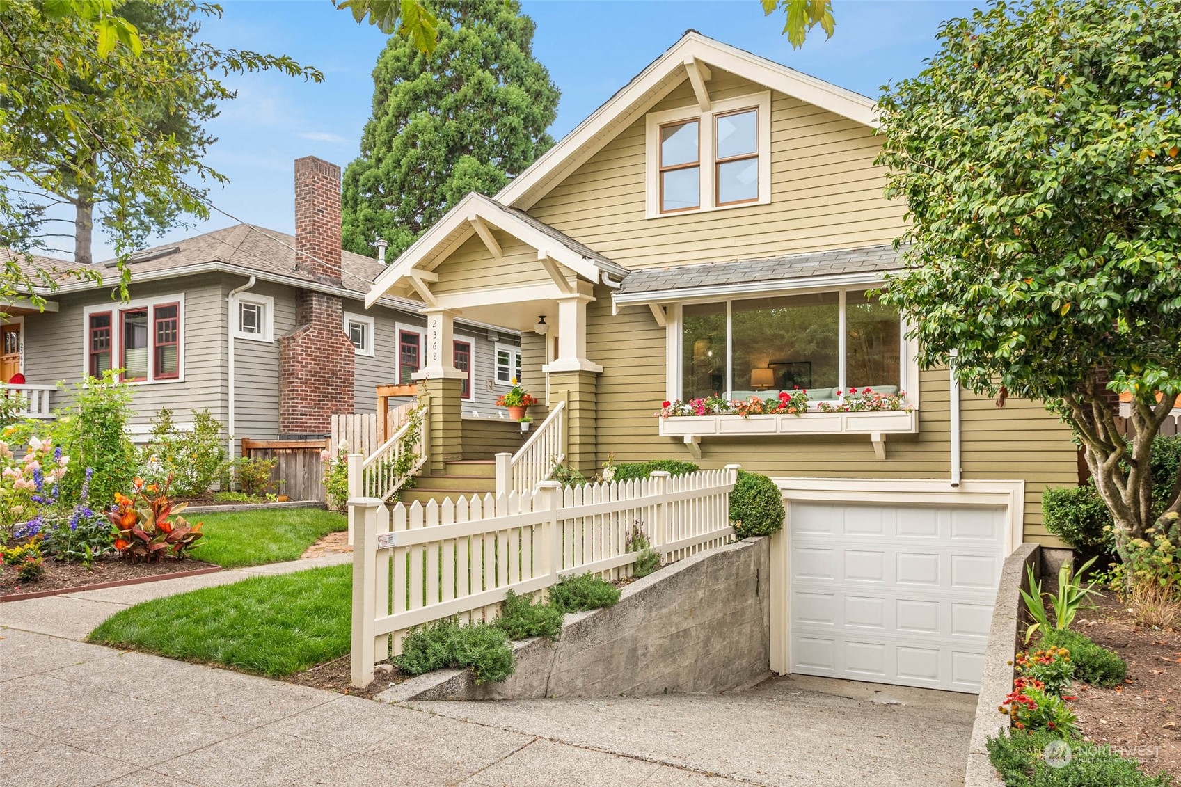 2368 North 52nd Street Seattle, WA 98103 - Photo 2 of 32 a front view of a house with a porch
