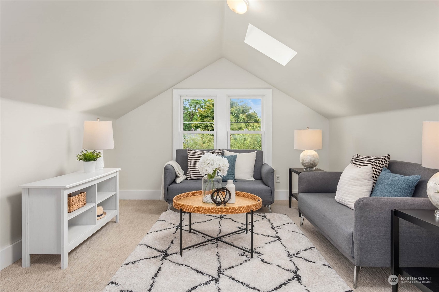 2368 North 52nd Street Seattle, WA 98103 - Photo 25 of 32 a living room with furniture and a window