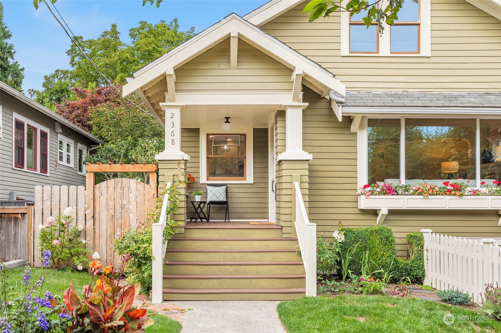 2368 North 52nd Street Seattle, WA 98103 - Photo 3 of 32 a front view of a house with a porch