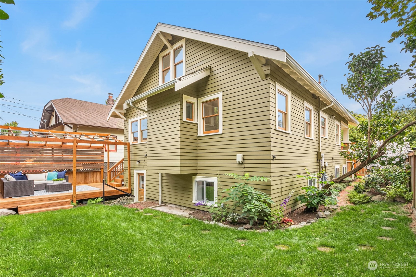 2368 North 52nd Street Seattle, WA 98103 - Photo 32 of 32 a view of a house with a backyard