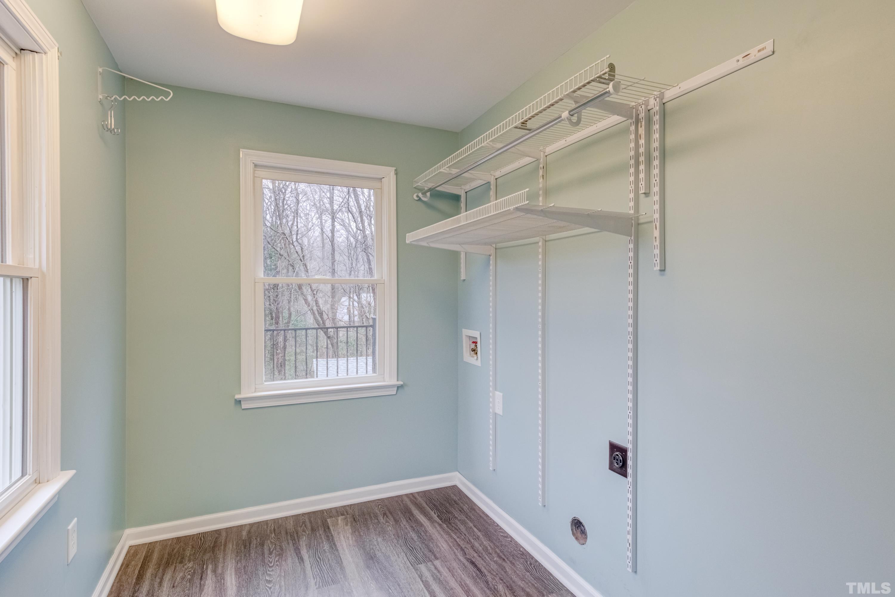 605 Jordan Ridge Lane Raleigh, NC 27603 - Photo 15 of 36 a view of a small space with wooden floor and windows