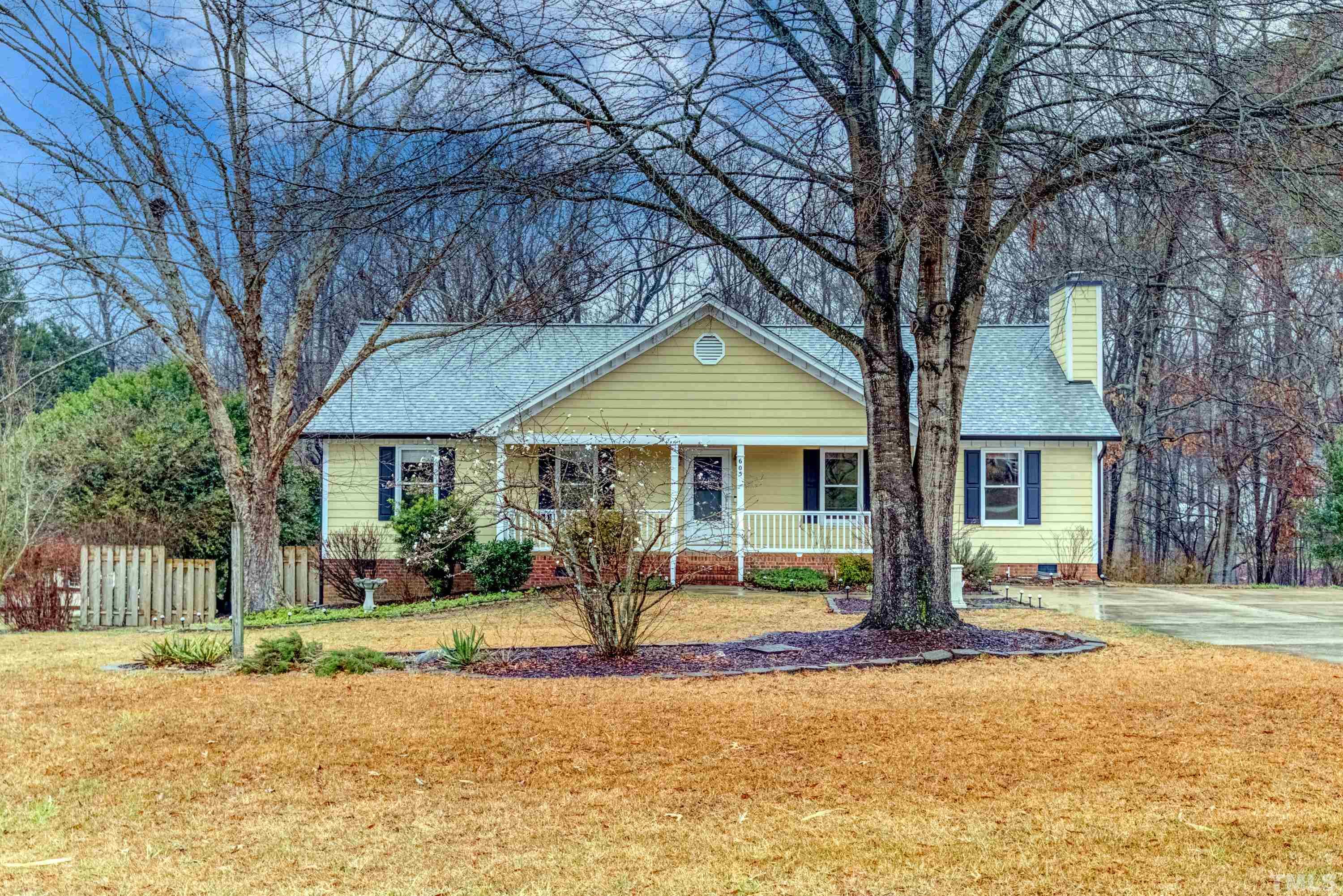 605 Jordan Ridge Lane Raleigh, NC 27603 - Photo 2 of 36 a front view of a house with a yard