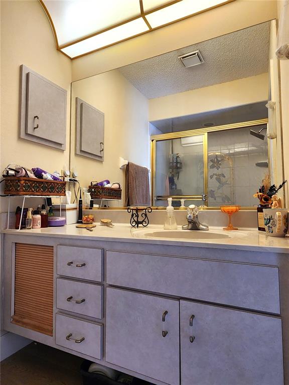 1701 Southeast 24th Road, Unit 1601 Ocala, FL 34471 - Photo 16 of 30 a bathroom with a sink and a mirror