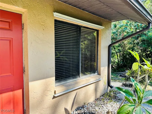 a bathroom with a tub and shower