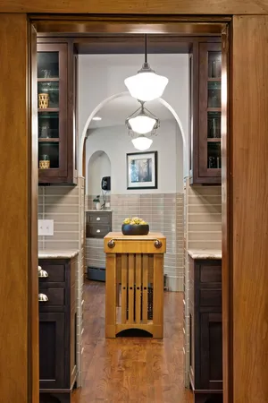 a kitchen with a stove and a microwave
