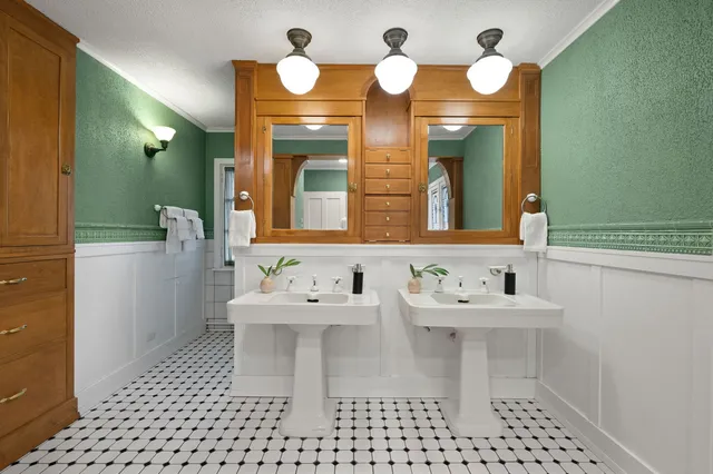 a bathroom with a toilet a sink and a bathtub