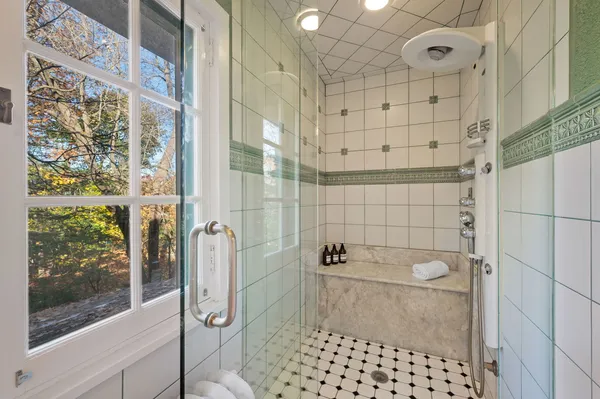 a bathroom with a toilet a sink and a bathtub