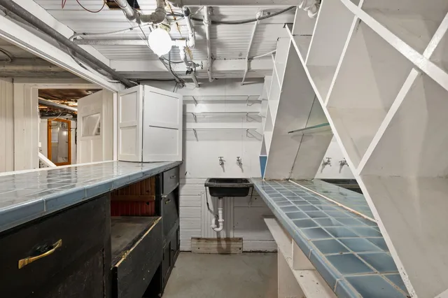 a view of an empty room with windows