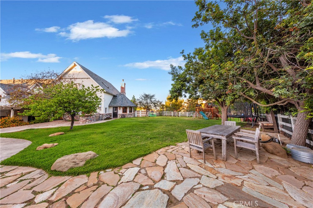 85 Saddlebow Road Bell Canyon, CA 91307 - Photo 52 of 75 a view of a house with backyard porch and sitting area