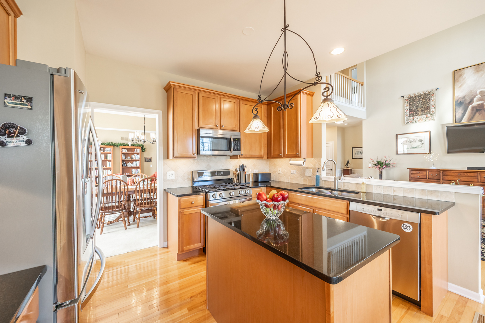 2737 Winton Court West Dundee, IL 60118 - Photo 15 of 52 a kitchen with stainless steel appliances granite countertop a sink a stove and a refrigerator