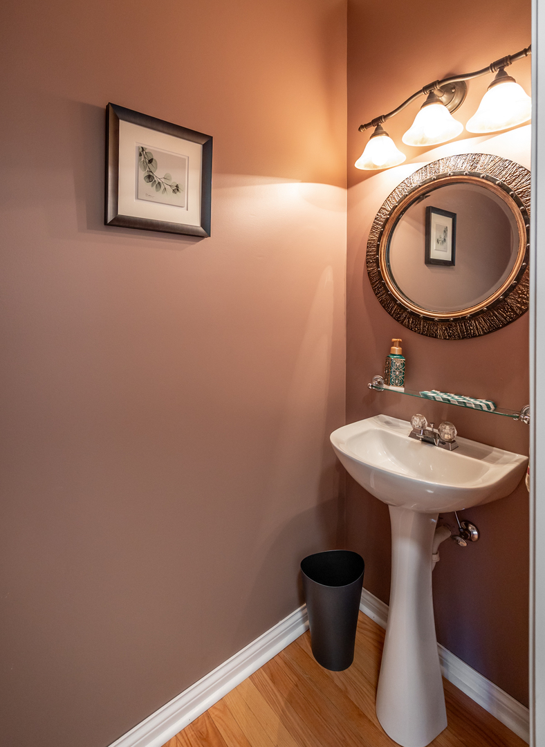 2737 Winton Court West Dundee, IL 60118 - Photo 22 of 52 a bathroom with a toilet a sink and a mirror
