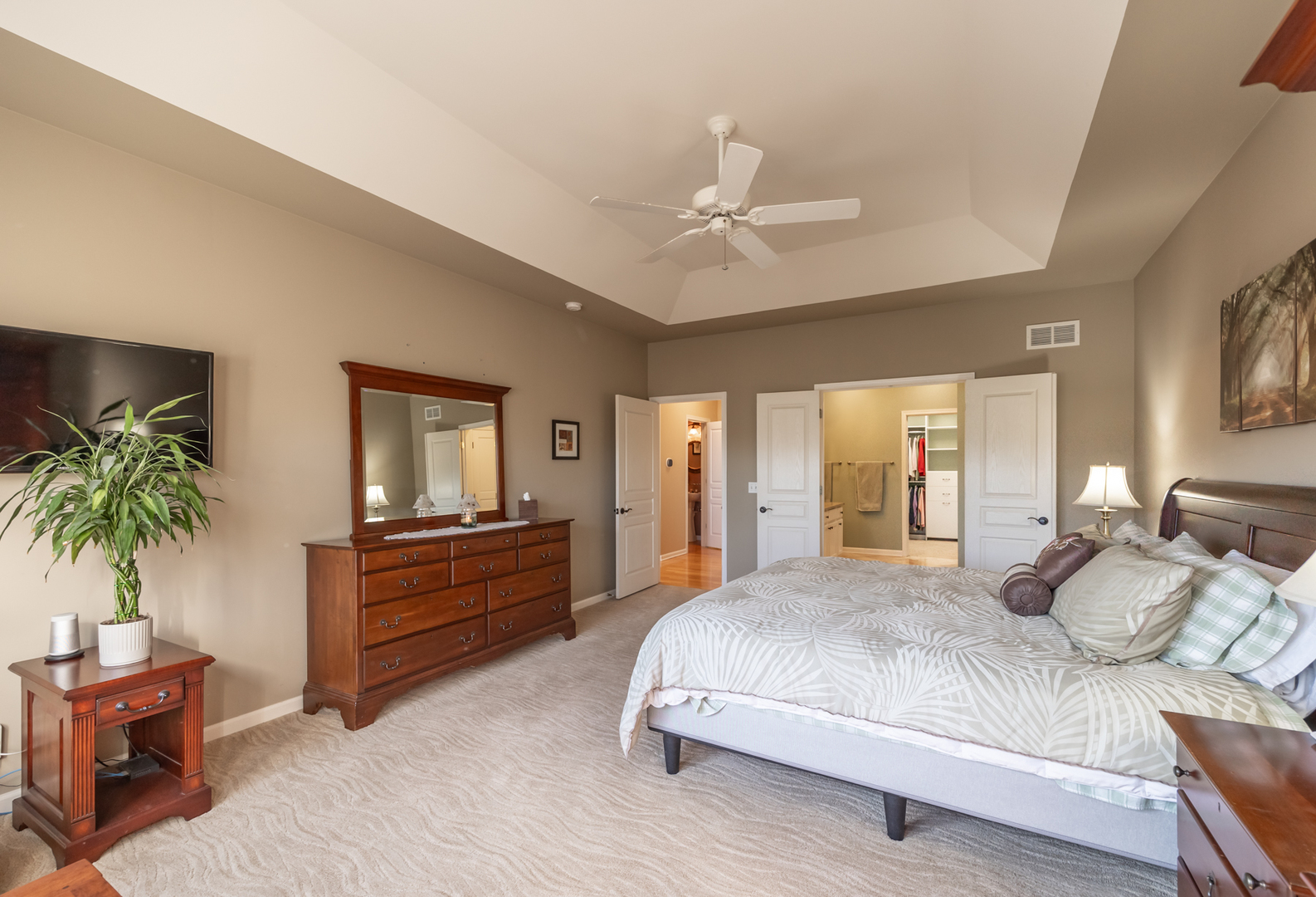 2737 Winton Court West Dundee, IL 60118 - Photo 26 of 52 a bedroom with a bed and a chandelier