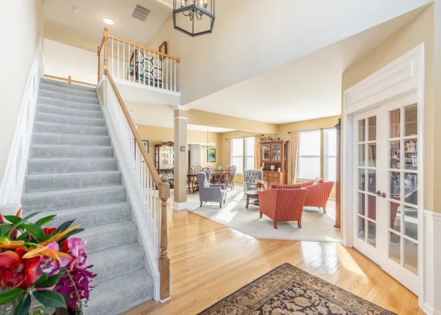 a view of an entryway with wooden floor