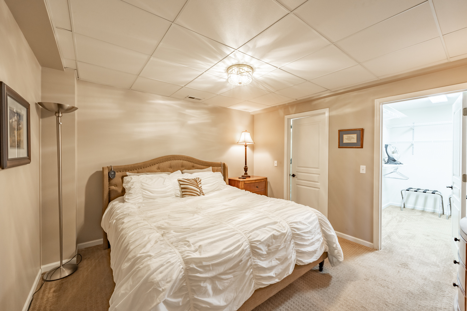 2737 Winton Court West Dundee, IL 60118 - Photo 45 of 52 a bedroom with a bed and a chandelier