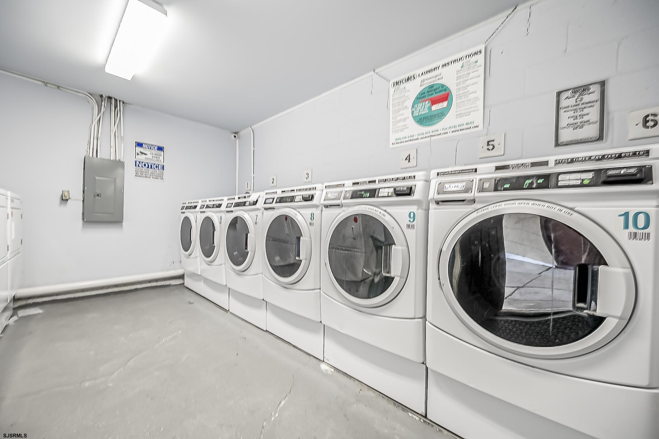 4901 Harbor Beach Boulevard, Unit Q3 Brigantine, NJ 08203 - Photo 15 of 19 a utility room with dryer and washer