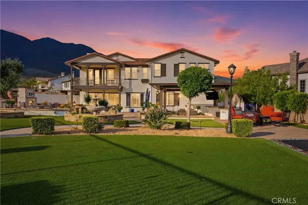 a view of a house with a swimming pool