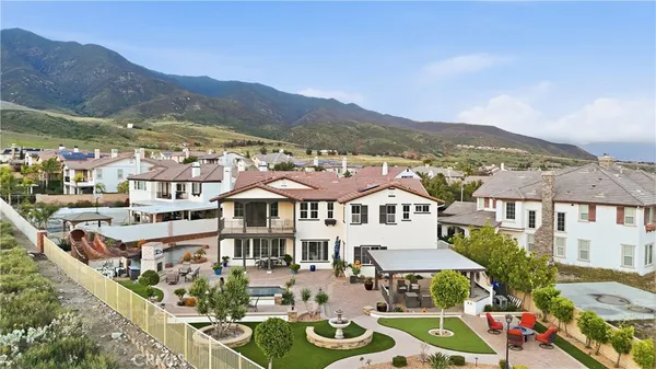 a view of a city with mountains in the background