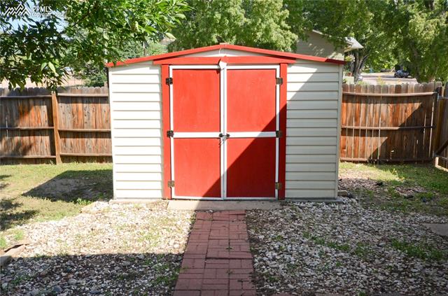 2124 North Chelton Road Colorado Springs, CO 80909 - Photo 32 of 36 Storage Shed