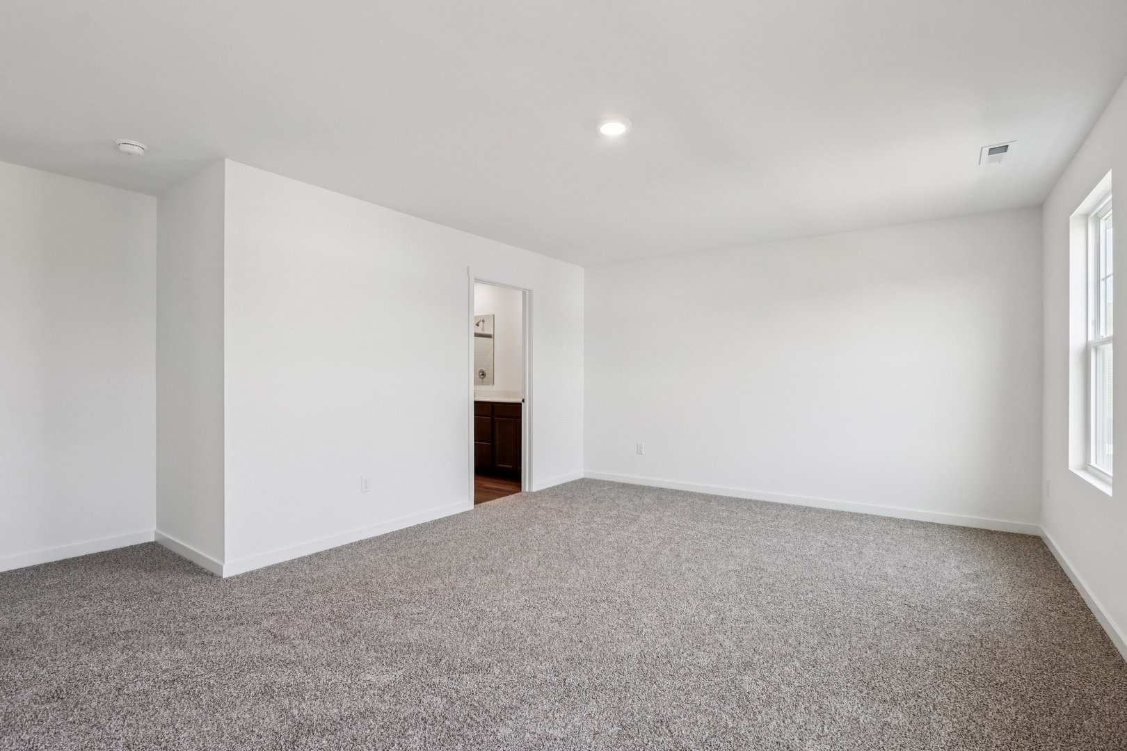 2561 Tahoe Lane Pingree Grove, IL 60140 - Photo 16 of 56 a view of an empty room with a window