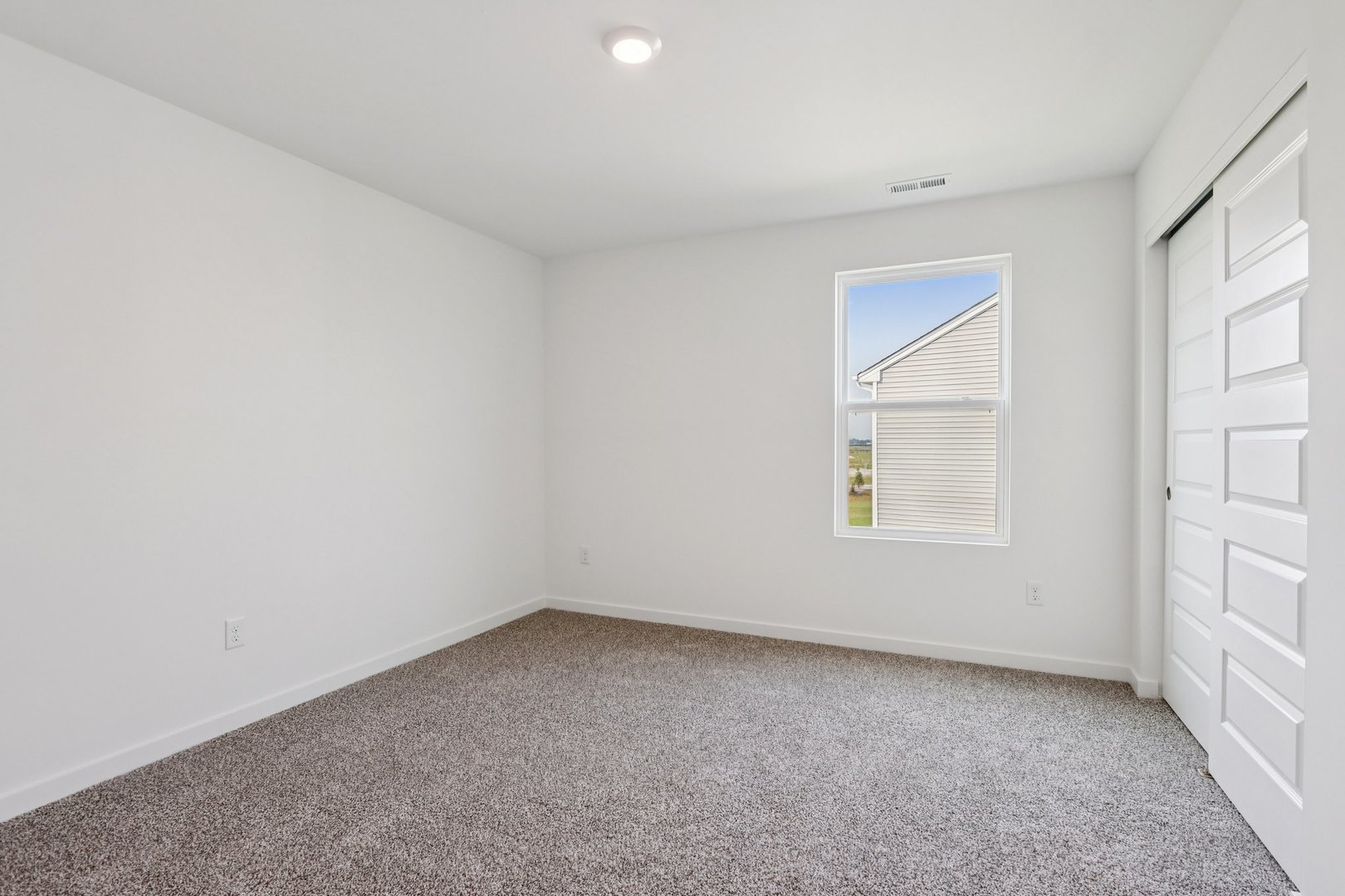 2561 Tahoe Lane Pingree Grove, IL 60140 - Photo 26 of 56 an empty room with a window