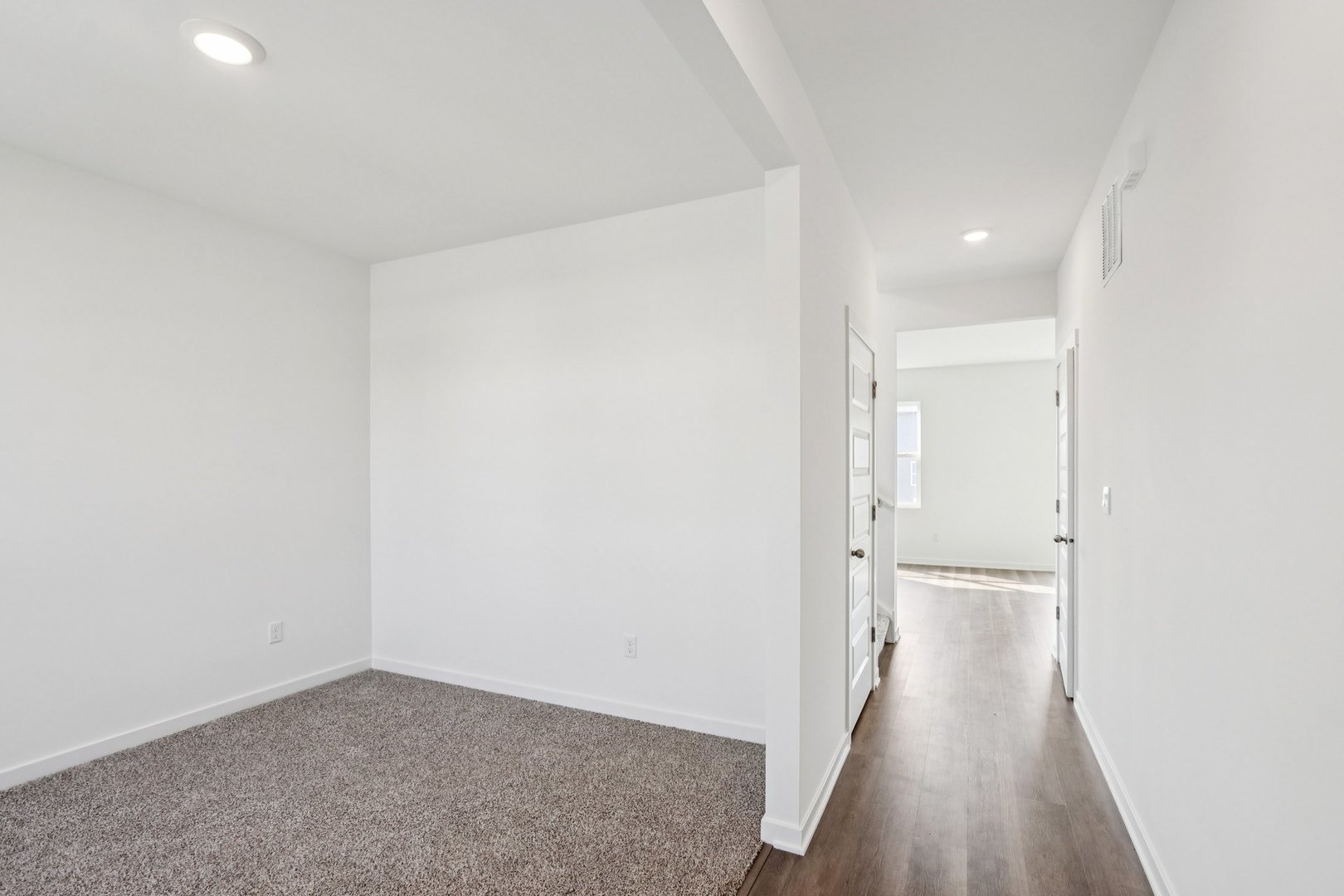 2561 Tahoe Lane Pingree Grove, IL 60140 - Photo 3 of 56 a view of a hallway with wooden floor