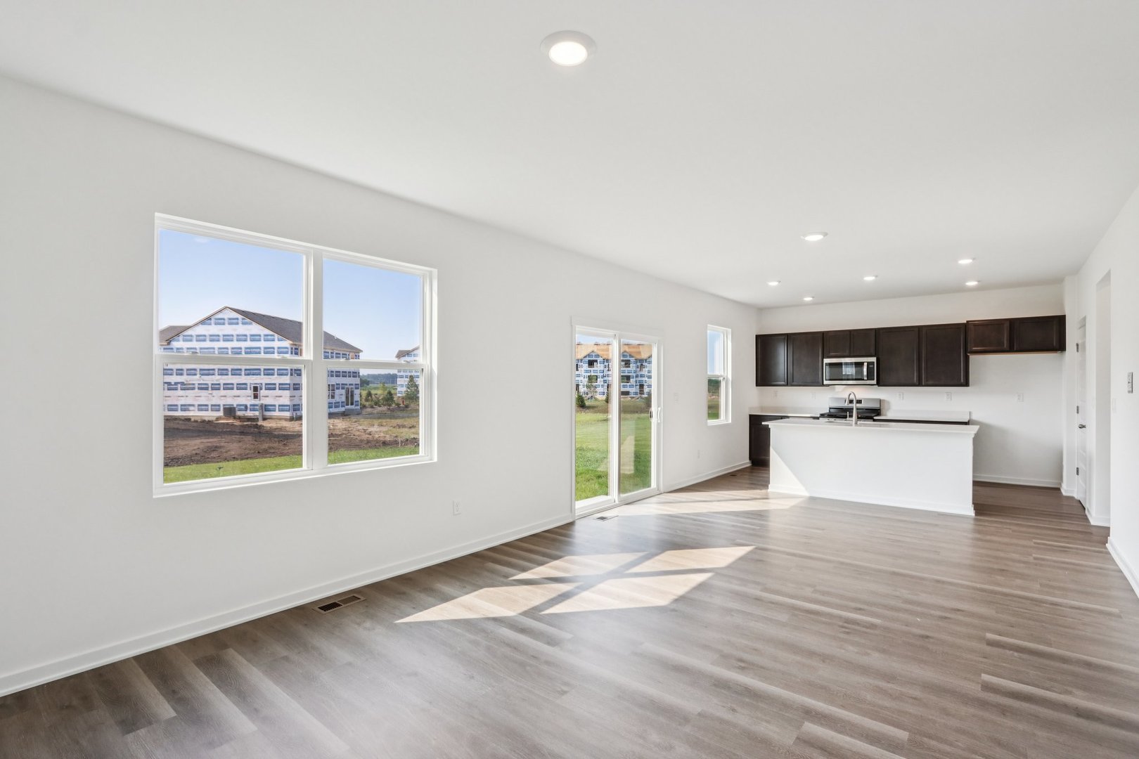 2561 Tahoe Lane Pingree Grove, IL 60140 - Photo 6 of 56 a view of kitchen with cabinets and window