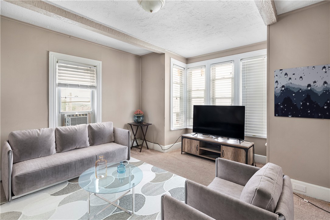 47 Paradis Avenue Woonsocket, RI 02895 - Photo 24 of 38 Unit 2 living room - virtually staged