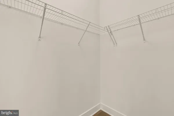 a bathroom with a shower and a toilet