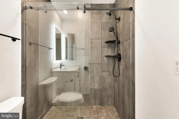 a bathroom with a sink and a toilet