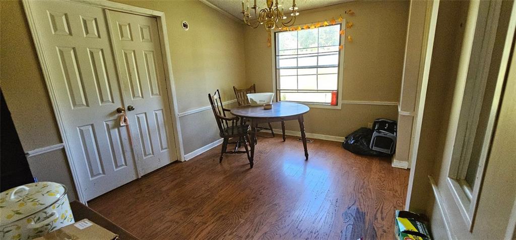 944 Lite-N-Tie Road Macon, GA 31211 - Photo 14 of 36 a view of a room with furniture window and wooden floor