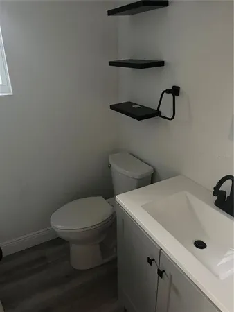 a bathroom with a sink and a toilet