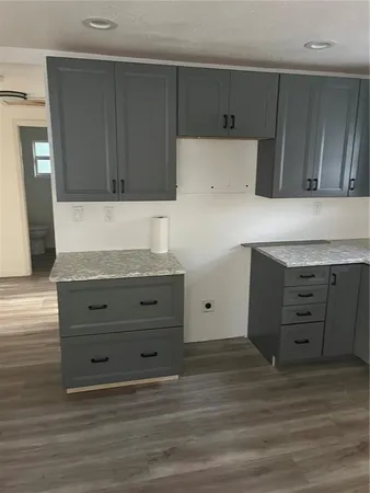 a view of cabinets and window