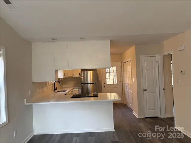 a living room with a couch and a table