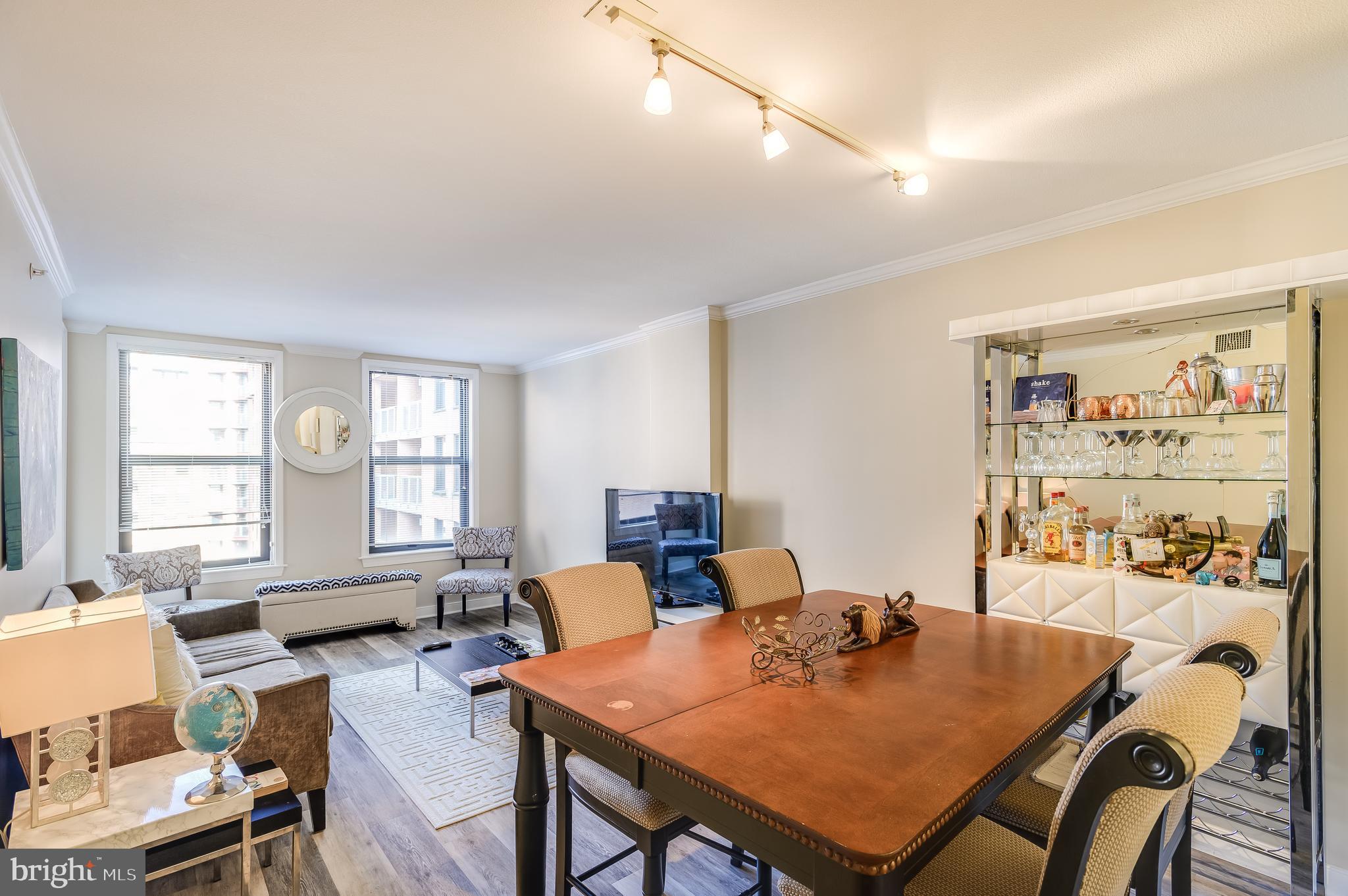 a view of a dining room with furniture
