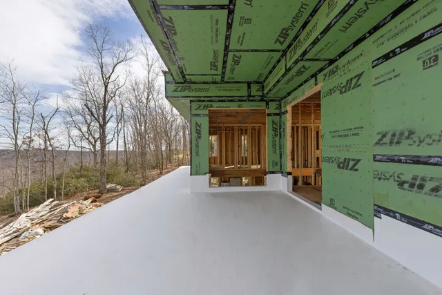 a view of swimming pool with a patio