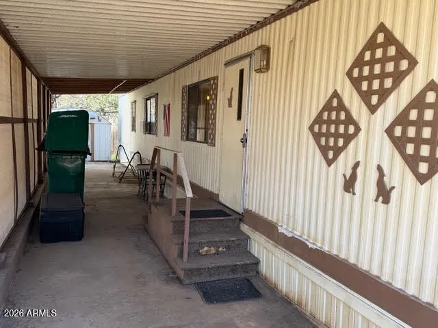 a view of entryway with wooden floor